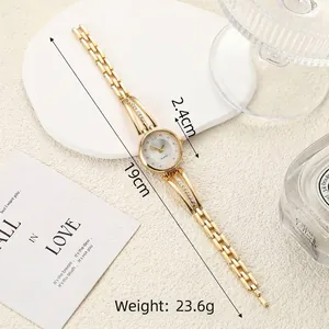 Detailed view of elegant gold rhinestone watch with 2.4cm dial and 19cm band