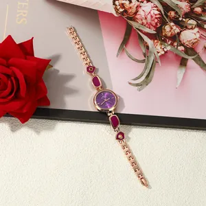Elegant rose gold bracelet watch for women featuring purple enamel and irregular links