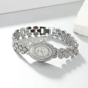 Elegant silver oval women's quartz watch with full rhinestone pave bracelet design