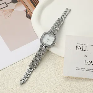 Detailed view of luxury silver rhinestone square quartz bracelet watch for women