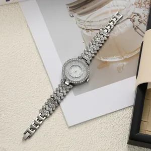 Detail view of a luxury women's watch with rolling beads and rhinestone alloy strap