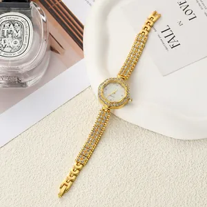 Elegant flower-shaped gold rhinestone women's quartz watch with matching linked bracelet