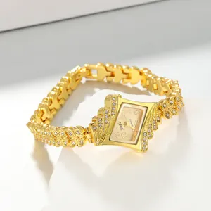 Detail view of an elegant gold rhinestone ladies' quartz bracelet watch with a unique dial