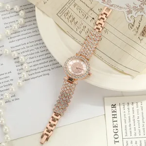 Elegant rose gold women's watch with shimmering rhinestone inlay and luxury detailing