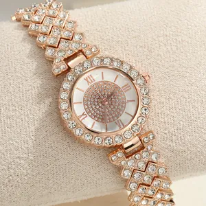 Macro view of rose gold women's watch featuring a full rhinestone-set dial and band