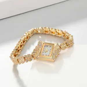 Close-up detail of elegant rose gold bracelet watch with sparkling rhinestones
