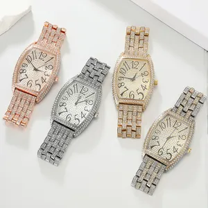 Luxury ladies quartz watches with full rhinestone pavé and artistic tonneau dial
