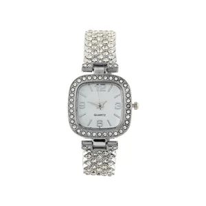 Elegant silver square women's watch featuring sparkling rhinestones and textured bracelet strap