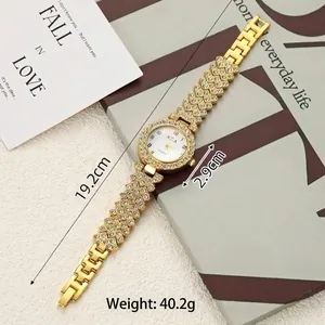 Detailed view of elegant gold rhinestone bracelet watch with dimensions and weight