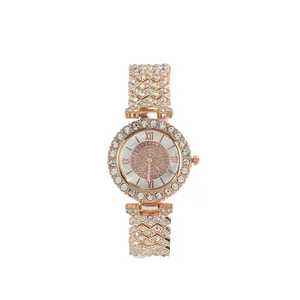 Detailed macro view of a rose gold pavé diamond ladies watch with Roman numerals