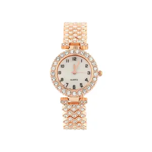 Luxurious rose gold women's fashion watch with full rhinestone bezel and bracelet