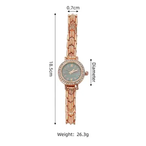 Macro view of rose gold rhinestone lady's watch showing band and dial measurements.