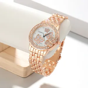 Elegant rose gold ladies quartz watch featuring butterfly dial and rhinestone bezel detail