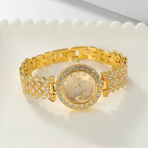 Elegante goudkleurige dameshorloge met strass vlinder wijzerplaat en kristallen armband