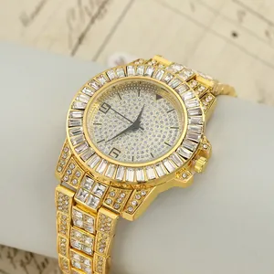 Close-up of luxury gold iced out quartz watch with full rhinestone dial and band