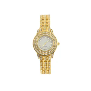 Detailed view of elegant gold-toned quartz bracelet watch featuring full rhinestones