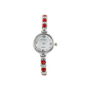 Elegant silver women's bracelet watch with sparkling red rhinestones and white quartz dial