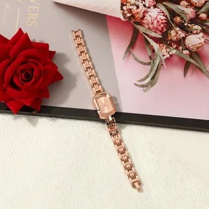 Elegant rose gold rectangular ladies quartz watch with link strap and floral background