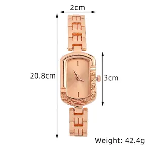 Close-up of rose gold square quartz watch showing dimensions and 42.4g weight