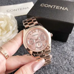 Macro view of rose gold CONTENA quartz watch showing multi-function dials and metal strap