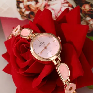 Elegant women's quartz watch featuring pink enamel bracelet detail on a red rose