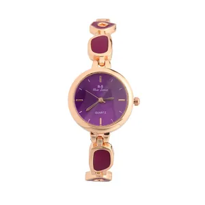 Detail view of purple dial quartz watch with rose gold irregular bracelet design