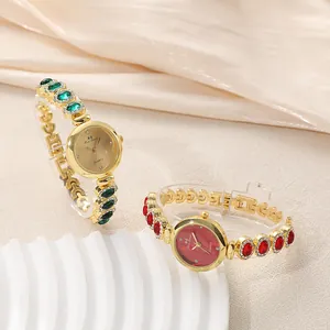 Luxury gold-tone women's jewelry wrist watch with vibrant gem-set bracelet strap style