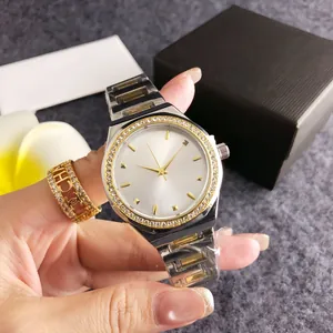 Luxury women's watch with white dial, crystal bezel, and two-tone steel band detail