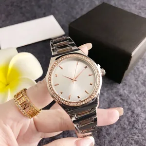 Elegant women's watch featuring a rose gold crystal bezel and a silver stainless steel strap