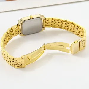 Detailed back view of a luxury gold rectangular quartz watch with stainless steel band