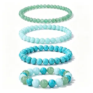 Set of four healing natural stone beaded bracelets with turquoise and green crystals