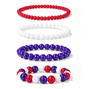 Detailed stack view of four colorful elastic beaded bracelets in red white and purple