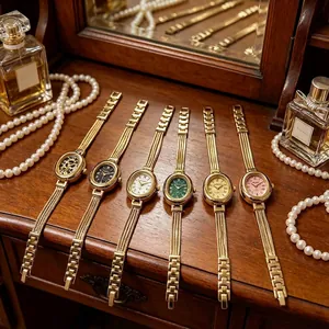 Elegantes Set aus Damenquarzuhren in Ovalform mit edlen goldenen Gliederarmbändern