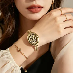 Elegante ovale Damen-Quarzuhr mit Leoparden-Zifferblatt und goldfarbenem Milanaise-Armband