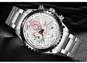 Détail d'une montre homme en acier inoxydable argenté avec cadran blanc et index rouges vifs
