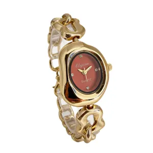 Montre à quartz élégante pour femme avec cadran ovale et bracelet gourmette doré massif