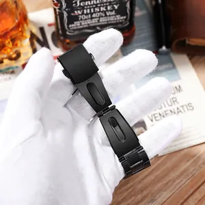 Close-up detail of a premium matte black stainless steel watch strap folding buckle clasp