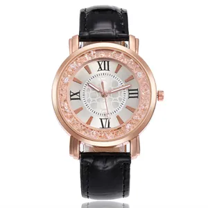 Elegant rose gold ladies quartz watch with rhinestone bezel and black embossed leather strap