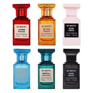 Collezione di sei vivaci flaconi di profumo in vari colori e fragranze vista dettaglio