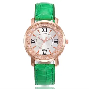 Elegant rose gold lady's watch featuring a vibrant green crocodile strap and sparkling crystal bezel
