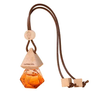 Elegante oranje glazen auto parfumfles met houten dop om op te hangen