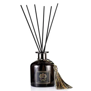 Diffuseur à bâtonnets 50 ml en flacon verre brun foncé avec roseaux et pompon doré