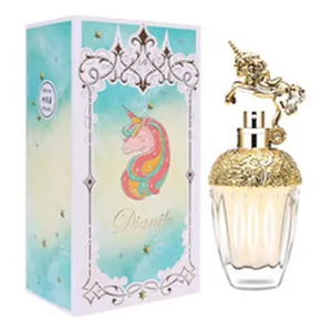 Elegante boccetta di profumo con tappo unicorno dorato e confezione turchese fiorita