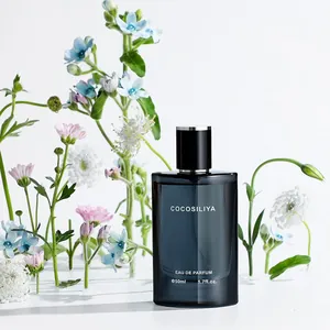 COCOSILIYA Deep Blue Men's Eau de Parfum 50ml bottle set against fresh floral background