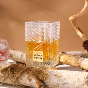 Arabian unisex fragrance in crystal glass bottle on birch wood logs