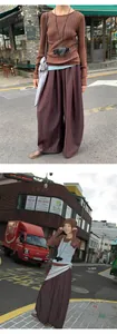 Stylish Korean brown wide-leg pants paired with a ribbed top and decorative scarf accent