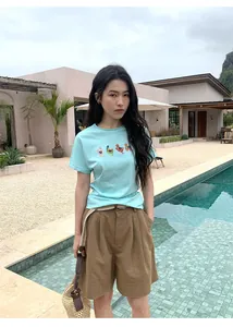 Stylish brown linen wide-leg casual shorts for women including a matching woven belt