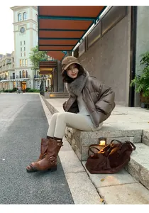 Professional outdoor lifestyle shot of woman wearing warm beige thermal yoga leggings.