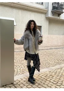 Fashionable gray thermal yoga leggings for women styled in a winter street look