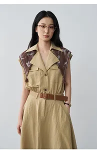 Elegant sleeveless A-line dress with lapel collar and horse print silk scarf detail